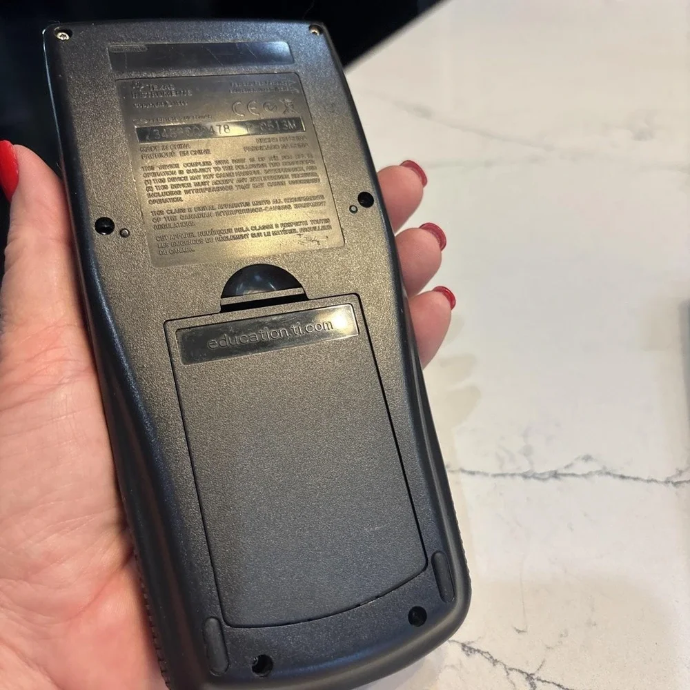 Texas Instruments TI-83 Plus Graphing Calculator with Slide Cover